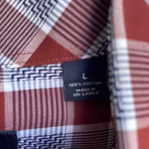 Only worn once. Button down. Never washed at home